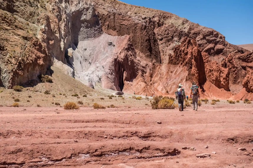 hikers Atacama Desert rocks