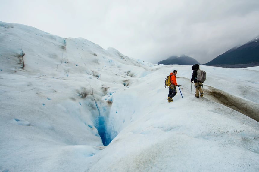 two people ice hiking on a glacier