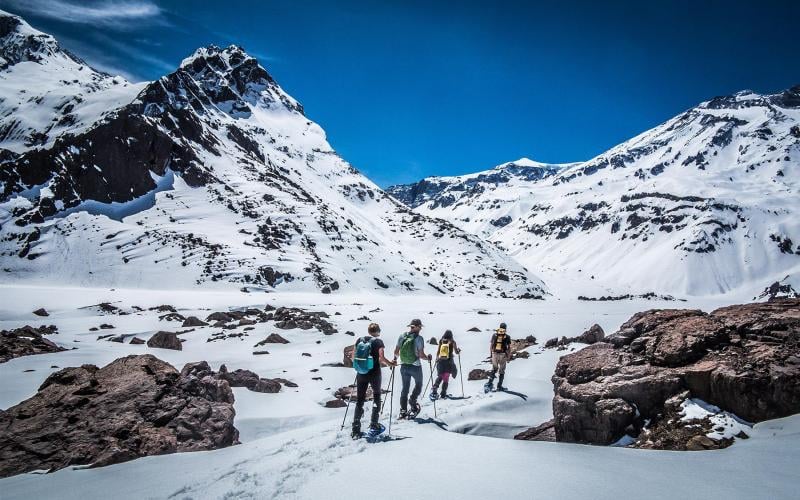 Hike the snowy Andes in winter day tour - Cascada Expediciones