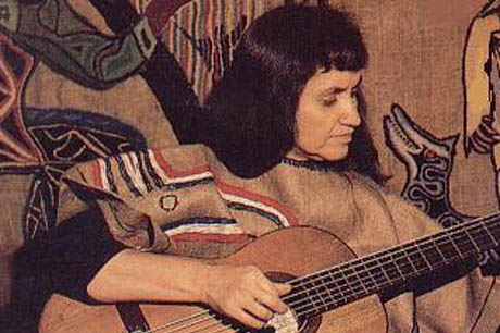 Violeta Parra playing guitar